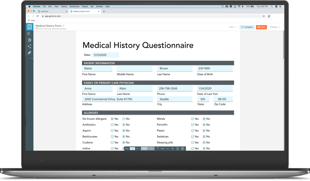 A medical history form being filled out on a laptop